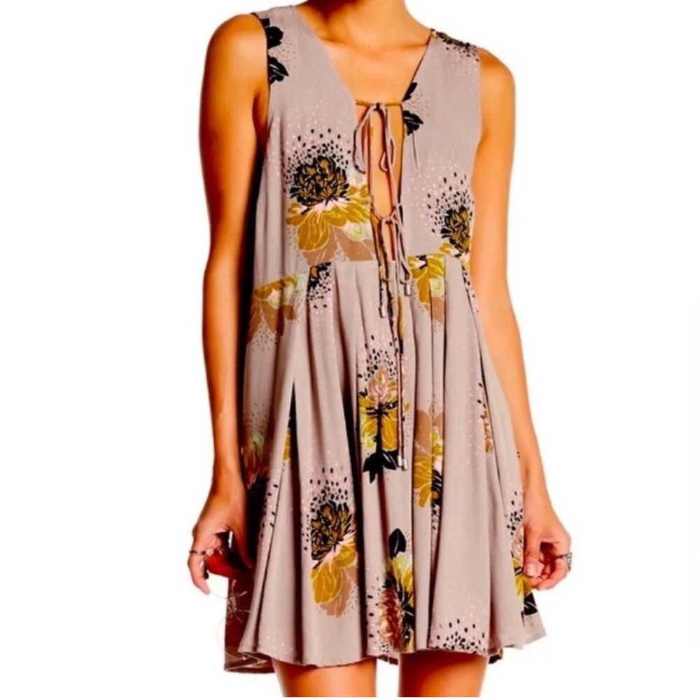 FREE PEOPLE. Tie front. Open back. Pink/Black floral dress. Large.